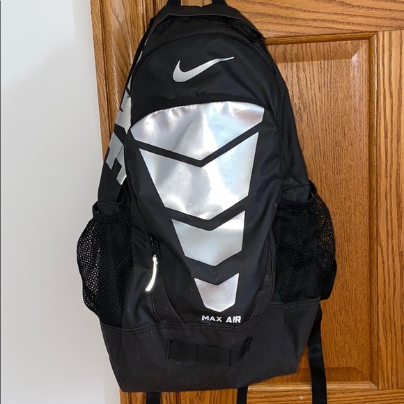 black and silver nike backpack